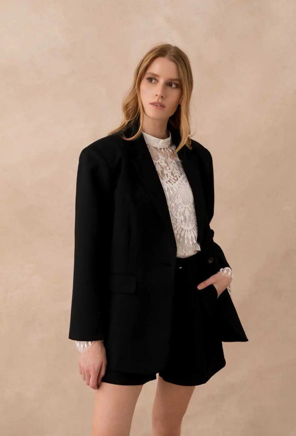Blazer oversize noir avec poches à rabats